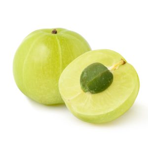 Fresh Indian gooseberry fruits with cut in half  isolated on white background. Clipping path.